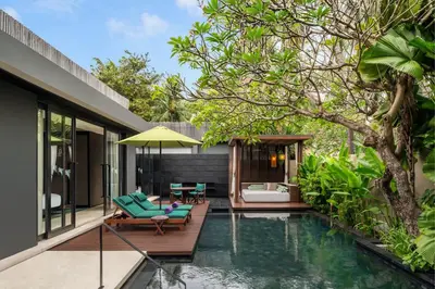 a pool in the backyard of a house at W Bali - Seminyak in Seminyak