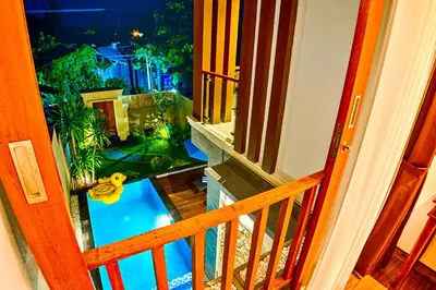 a view of a fish tank from a balcony at Villa Caitlyn, Seminyak - Modern 3 Bedroom Villa with Private Pool! in Seminyak