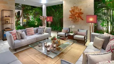 a living room with a couch and a table at Casa Brio in Seminyak
