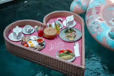 a tray of food in the shape of a heart at La Vie Villa Seminyak by Ini Vie Hospitality in Seminyak