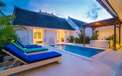 a swimming pool in the backyard of a villa at Villa Ley Double Six by Best Deals Asia Hospitality in Seminyak