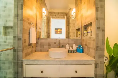 a bathroom with a sink and a shower at Villa Ley Double Six by Best Deals Asia Hospitality in Seminyak