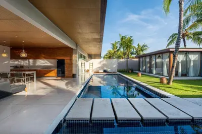 a swimming pool in the backyard of a house at One Eleven in Seminyak