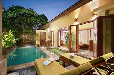 a pool in the backyard of a villa at Nyuh Bali Villas in Seminyak