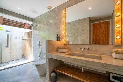 a bathroom with a large sink and a shower at Villa Love Umalas in Kerobokan