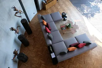 an overhead view of a living room with a couch at Dacolina House in Jimbaran