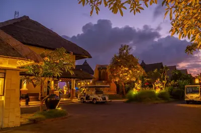 a building with a car parked in front of it at Villa Seminyak Estate & Spa - By Astadala in Seminyak