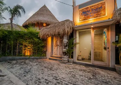 a building with a sign on the side of it at Luxury Villas Merci Resort 3BR Seminyak #2 in Kuta