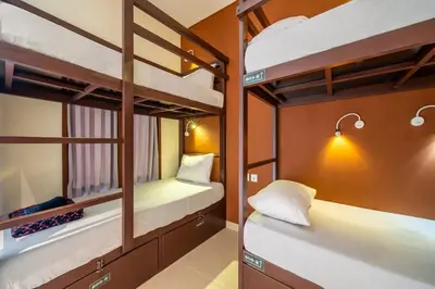 a bunk bed room with two bunk beds at Gelatik Bed And Breakfast in Seminyak