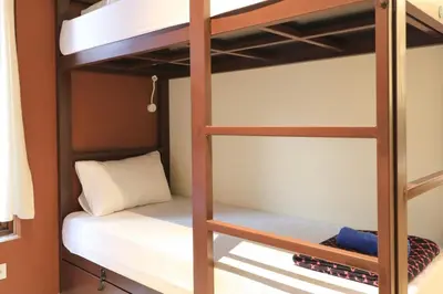 a bunk bed room with a bunk bed in a room at Gelatik Bed And Breakfast in Seminyak