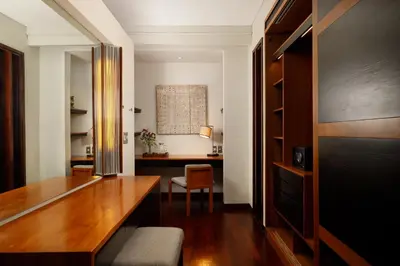 a home office with a desk and a chair at Villa Camellia by Nakula in Jimbaran