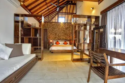a bedroom with bunk beds and a bed in a room at Villa Esperanto Seminyak in Seminyak