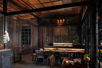 a dining room with a table and chairs at Padma Resort Legian in Legian