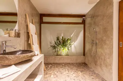 a bathroom with a sink and a shower at Villa Namu by Alfred in Bali in Seminyak