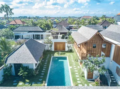 an aerial view of a house with a swimming pool at Villa Namu by Alfred in Bali in Seminyak