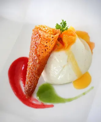 a plate of food with an egg and a piece of bread at The Samaya Seminyak Bali in Seminyak