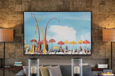 a painting of a beach with umbrellas at Mosan House - unique art-filled gem in perfect location a short walk from the beach or Seminyak Square including AC office for remote working in Seminyak