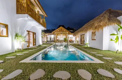 an exterior view of a villa with a swimming pool at House of Bagera by Alfred in Bali in Seminyak