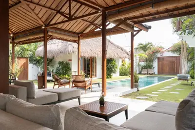 an outdoor living room with a pavilion and a pool at House of Bagera by Alfred in Bali in Seminyak