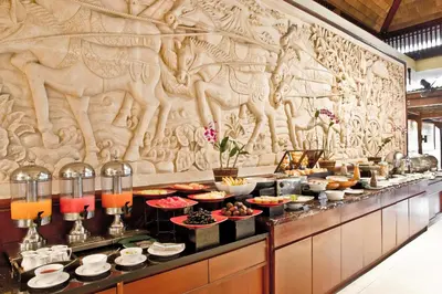 a buffet line with many different types of food at The Rani Hotel & Spa in Kuta