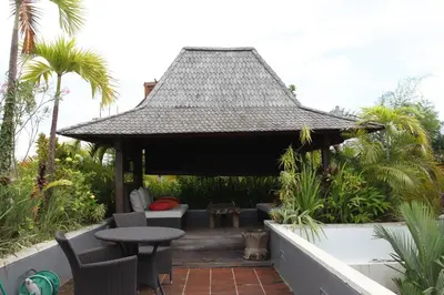 a gazebo in the middle of a garden at Villa Casa Bali - your home away from home in Seminyak