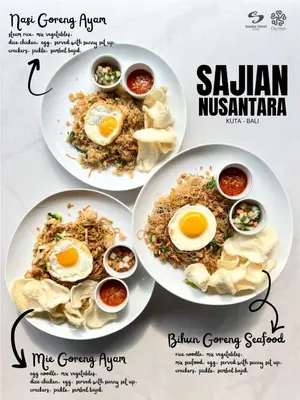 two plates of food with eggs on top at Sandat Hotel Legian in Legian