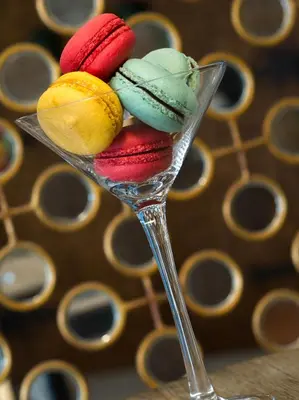 four colorful macaroons in a glass bowlasteryasteryasteryasteryasteryasteryastery at Sayang d'Amour in Seminyak