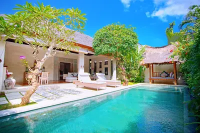 a pool in the backyard of a villa at Villa Bali Asri Batubelig in Seminyak