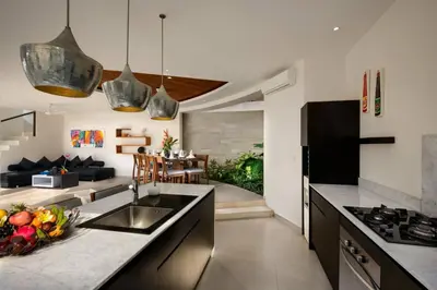 a kitchen with a sink and a counter top at Villa Miro - Luxury, 3 Bed, Central Seminyak in Seminyak