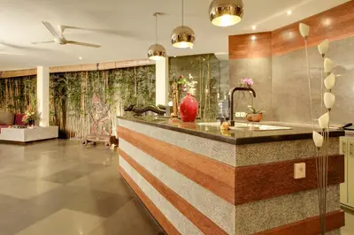 a kitchen with a counter with a sink at Elok Villas in Seminyak