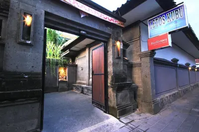 an entrance to a building with an open door at Letos Kubu Homestay in Kuta