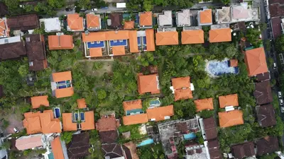 an overhead view of houses in a suburb at Three Brothers Bali Legian Bungalows & Villas in Legian