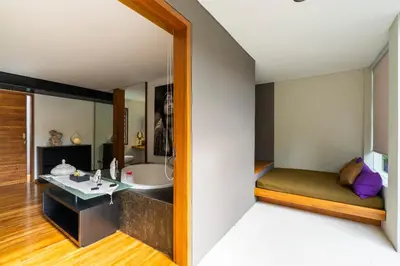 a bathroom with a sink and a mirror at Villa Athena in Seminyak