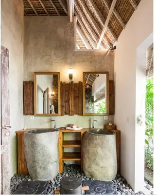 a bathroom with two sinks and a large tub at Villa Katapappa in Seminyak