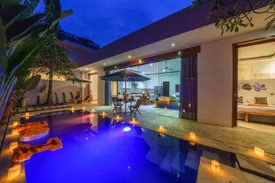 a swimming pool in the backyard of a house at Anema Villa Seminyak in Legian