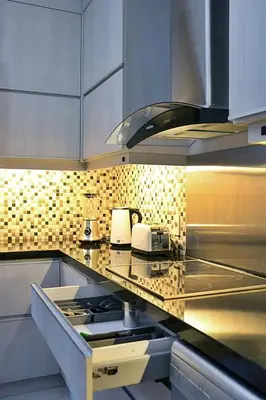 a kitchen with a counter with a toasterasteryasteryasteryasteryasteryasteryastery at Kedonganan Beach Villas in Jimbaran