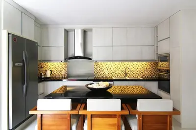 a kitchen with a counter with a bowl on it at Kedonganan Beach Villas in Jimbaran