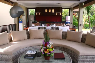a living room with a couch and a table at Imani Villas in Canggu
