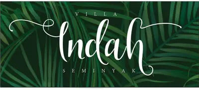 a calligraphy sign for a vacation in the middle of green leaves at Beautiful Villa Indah in Seminyak