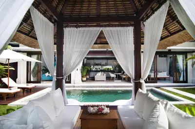 a villa with a swimming pool and a resort at 2BR Villa Michelle - Minggu Villas - Special Stay Bonus in Kerobokan