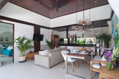 a living room with a couch and a table at 2BR Villa Michelle - Minggu Villas - Special Stay Bonus in Kerobokan