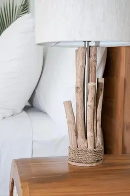 a table with a lamp on top of a nightstand at 2BR Villa Michelle - Minggu Villas - Special Stay Bonus in Kerobokan