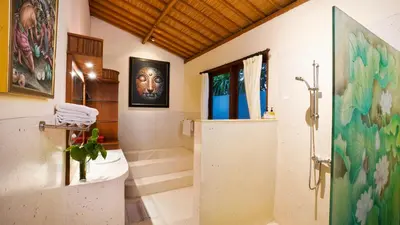 a bathroom with a shower and a toilet in it at Villa Bali Maja - Beautiful Private Pool Villa in Petitenget, Seminyak in Seminyak
