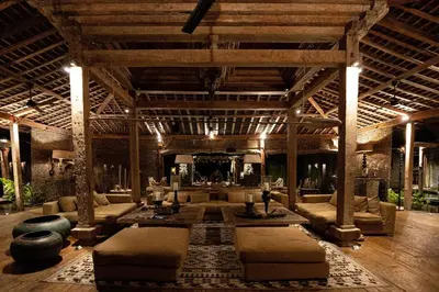 a large living room with couches and a table at Villa Jasli in Canggu