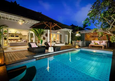 a swimming pool in a villa at night at Villa Bloom 4 - 2 King bedrooms , Sleep 4 Pax, private pool, Seminyak in Seminyak