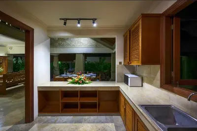 a kitchen with a sink and a counter top at Villa Deh Simba at Oberoi in Seminyak