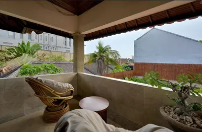 a balcony with a view of a building at Villa Deh Simba at Oberoi in Seminyak