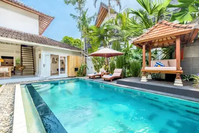 a swimming pool in the backyard of a villa at Villa London - Private 4 BDR Villa in Seminyak, Pool & Garden in prime Location in Seminyak
