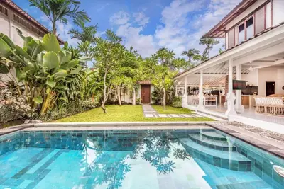 an image of a swimming pool in front of a house at Villa London - Private 4 BDR Villa in Seminyak, Pool & Garden in prime Location in Seminyak