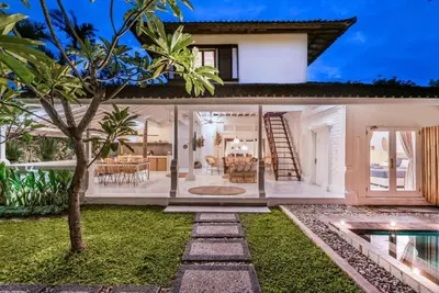 a villa with a swimming pool and a house at Villa London - Private 4 BDR Villa in Seminyak, Pool & Garden in prime Location in Seminyak